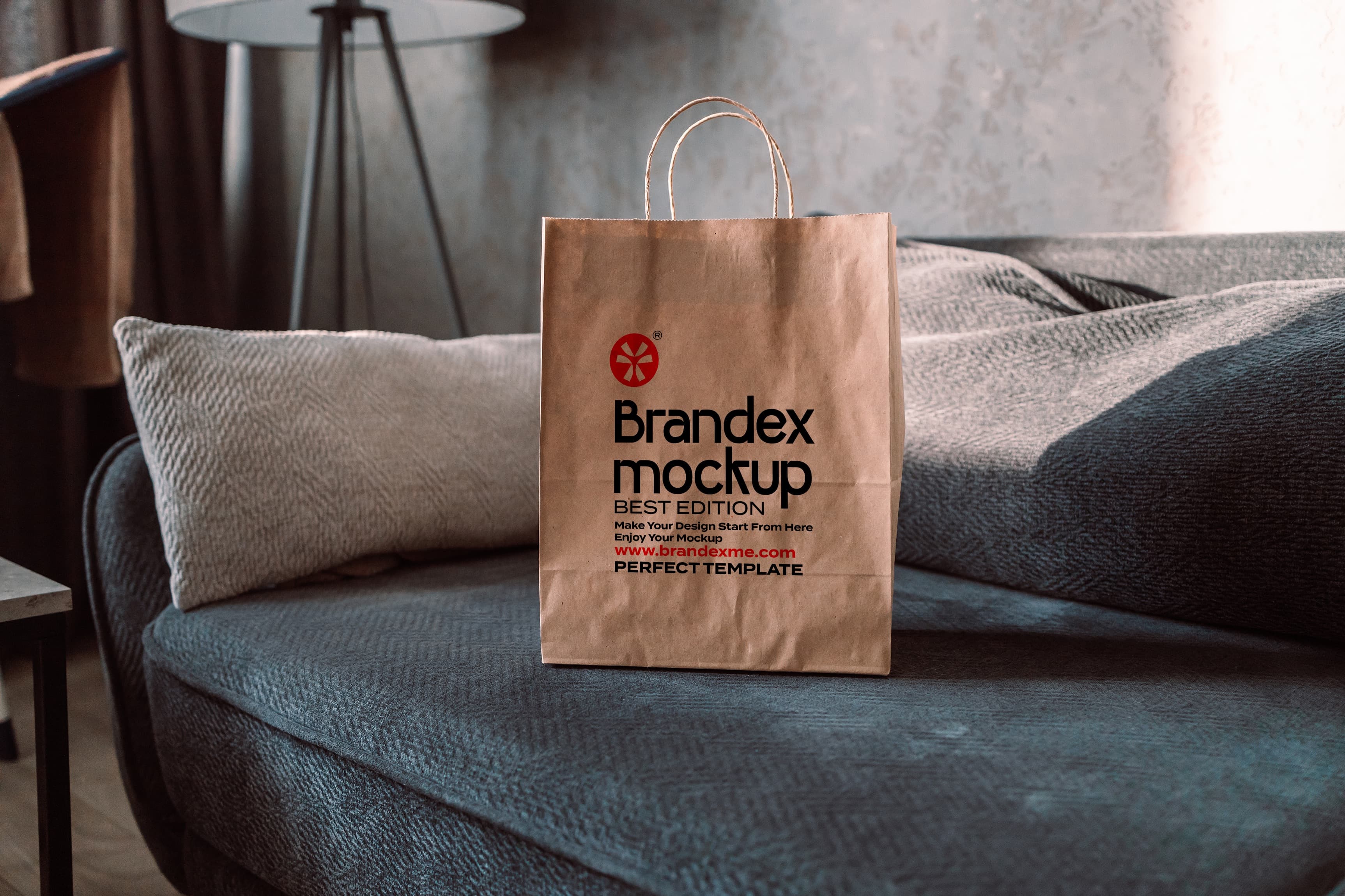 Brandex Mockup – Brown Paper Bag on Sofa Scene