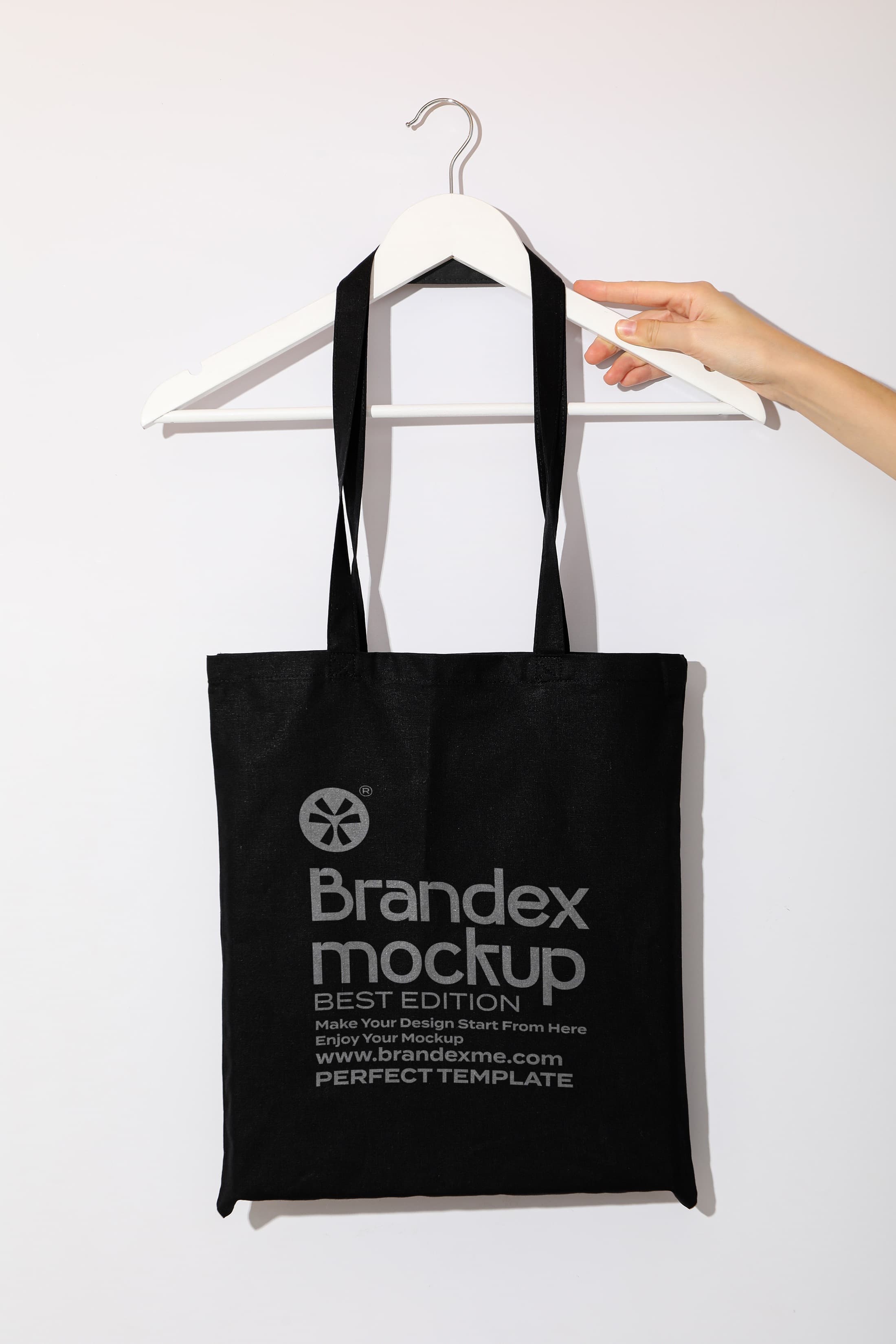 Brandex Mockup – Black Canvas Tote Bag Held on Hanger