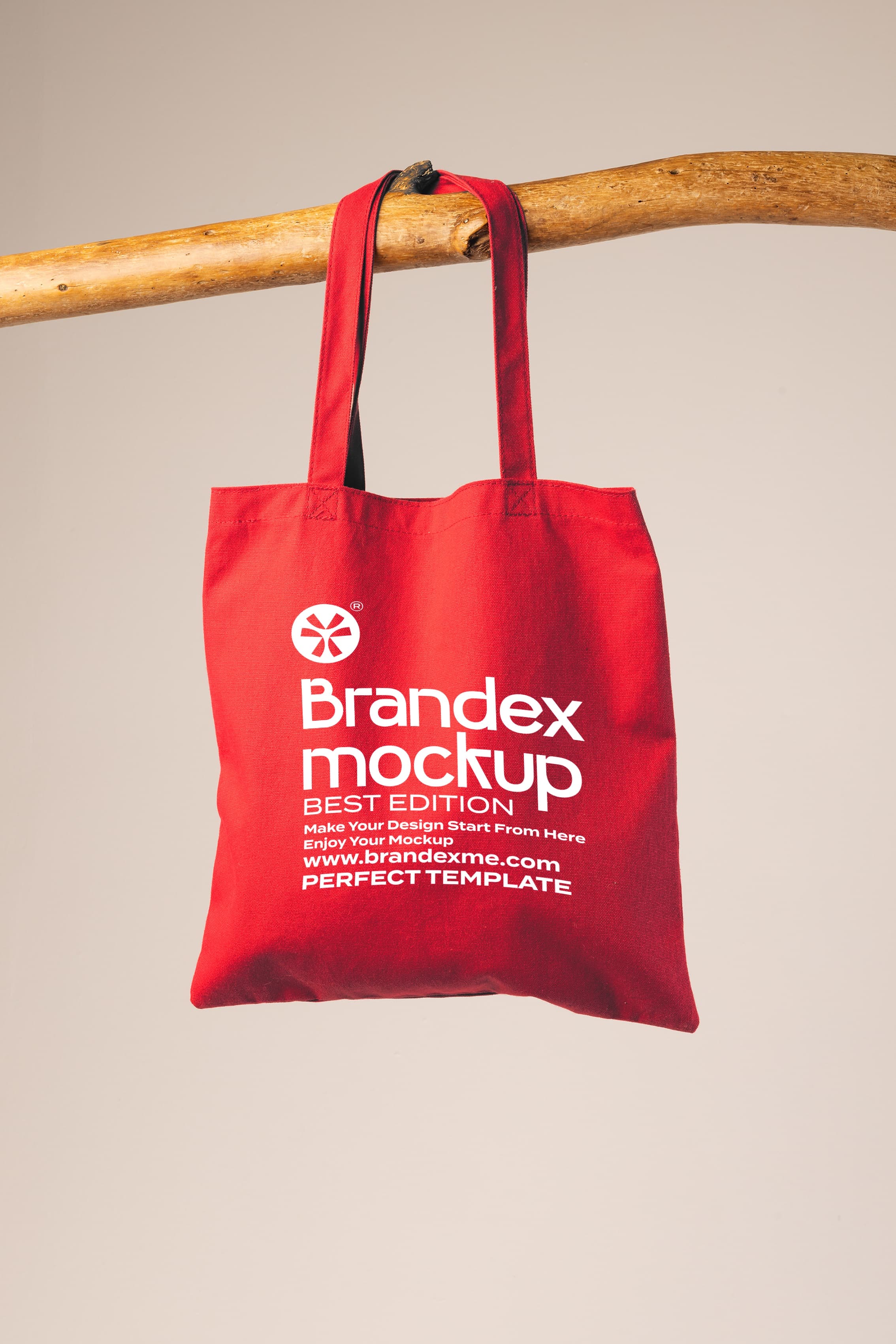 Brandex Mockup – Red Canvas Tote Bag Hanging on Wooden Rod