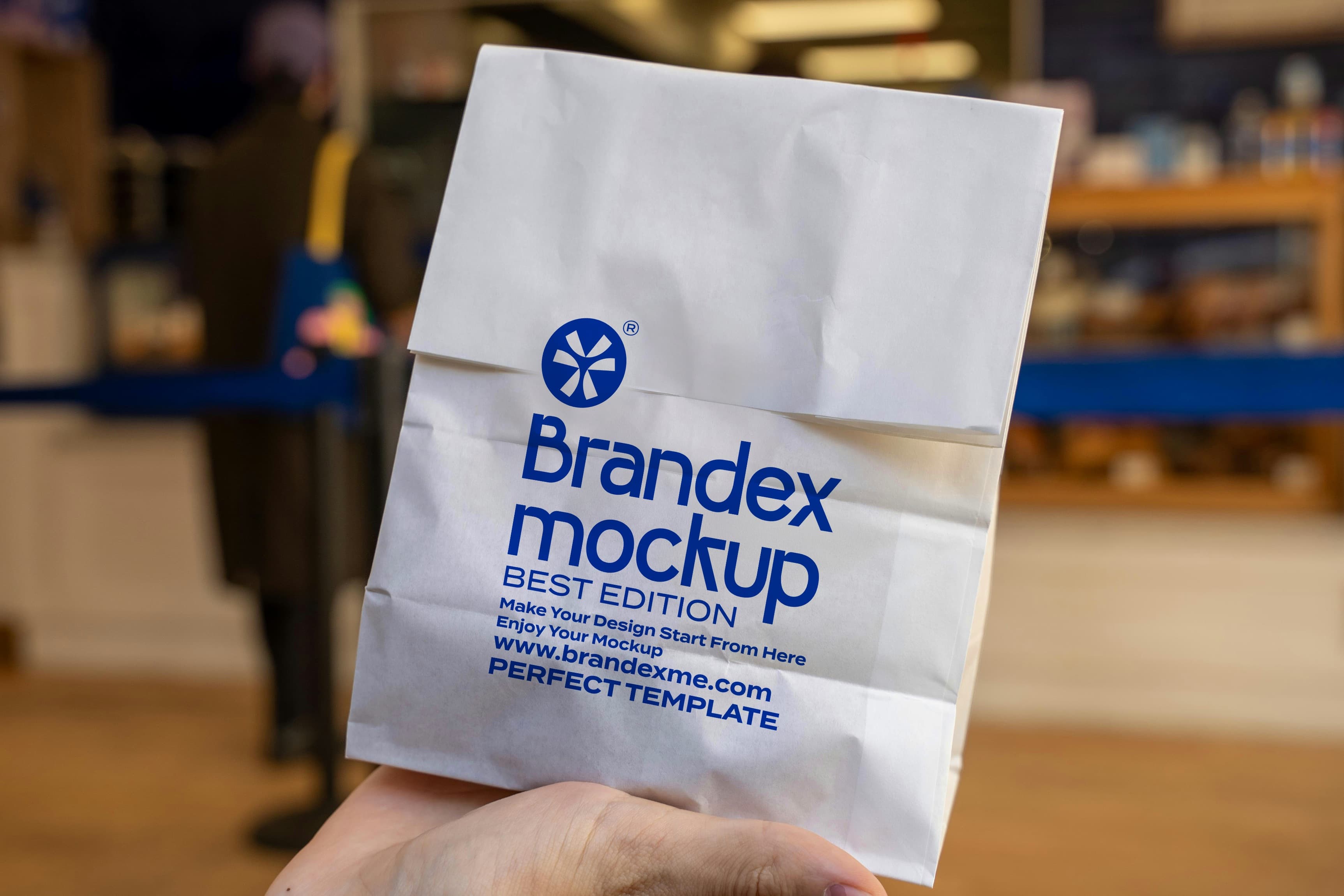 White paper bag with blue logo mockup