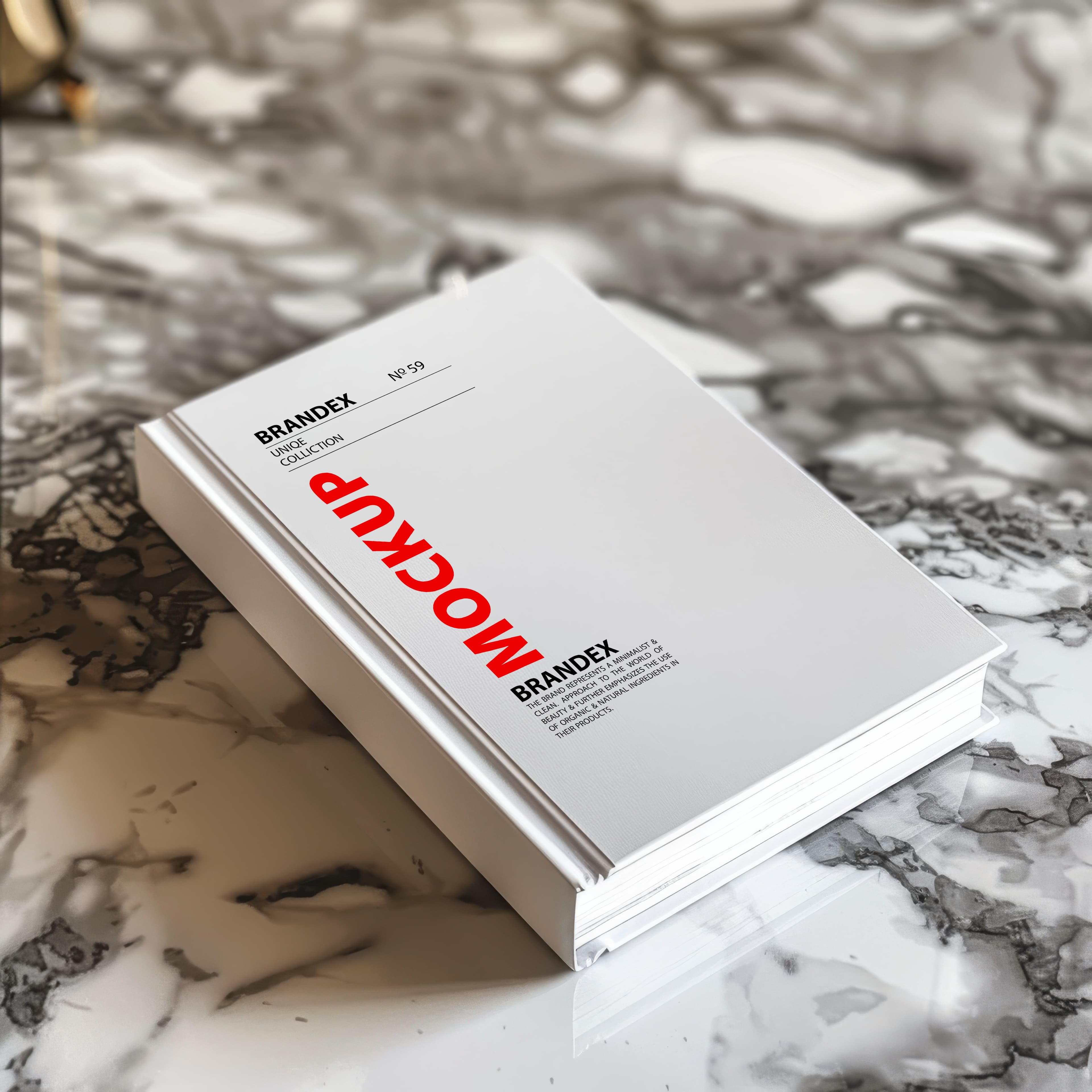 Hardcover book on marble surface mockup
