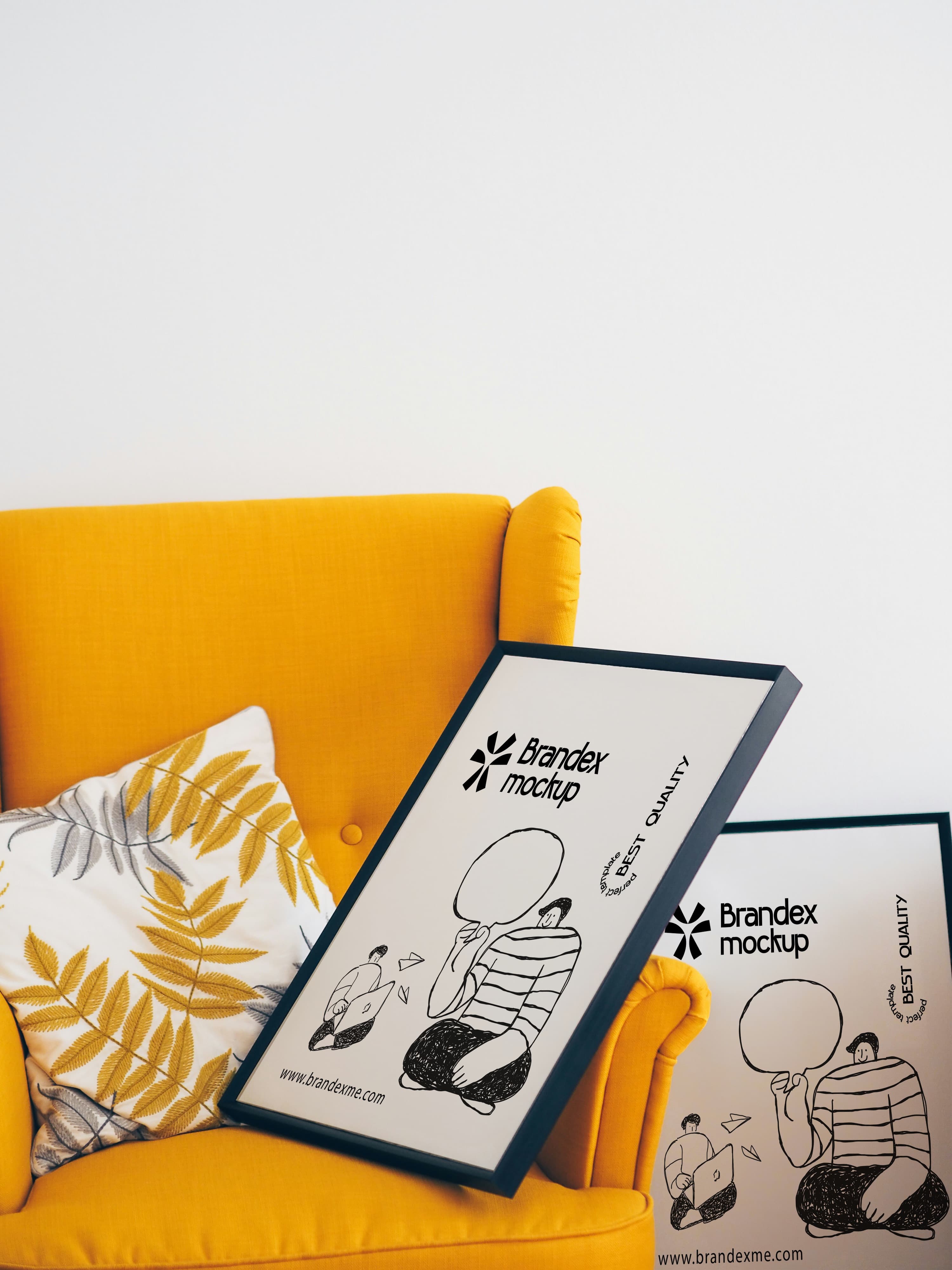 Framed poster on yellow armchair mockup