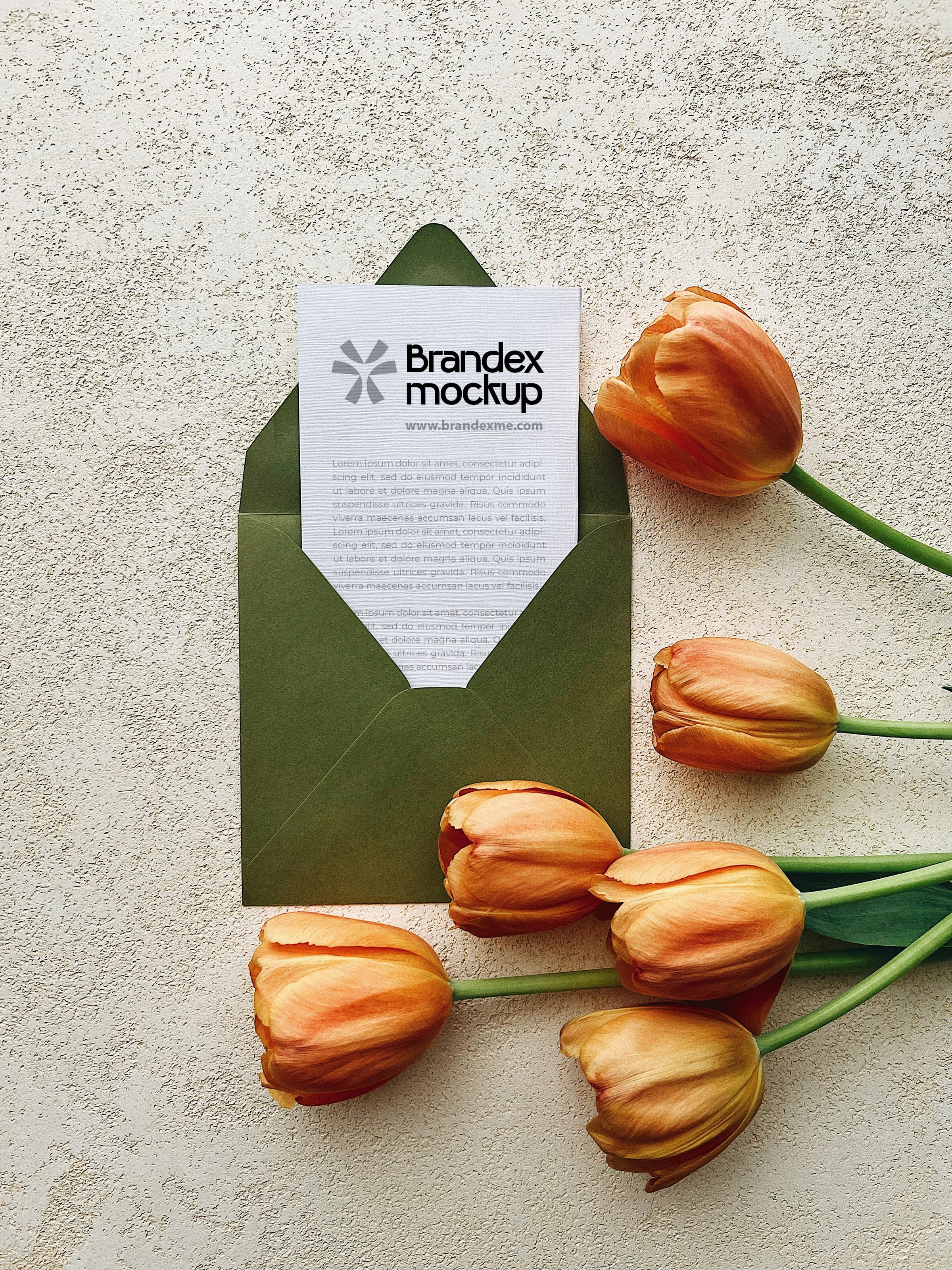 Green envelope with tulips mockup