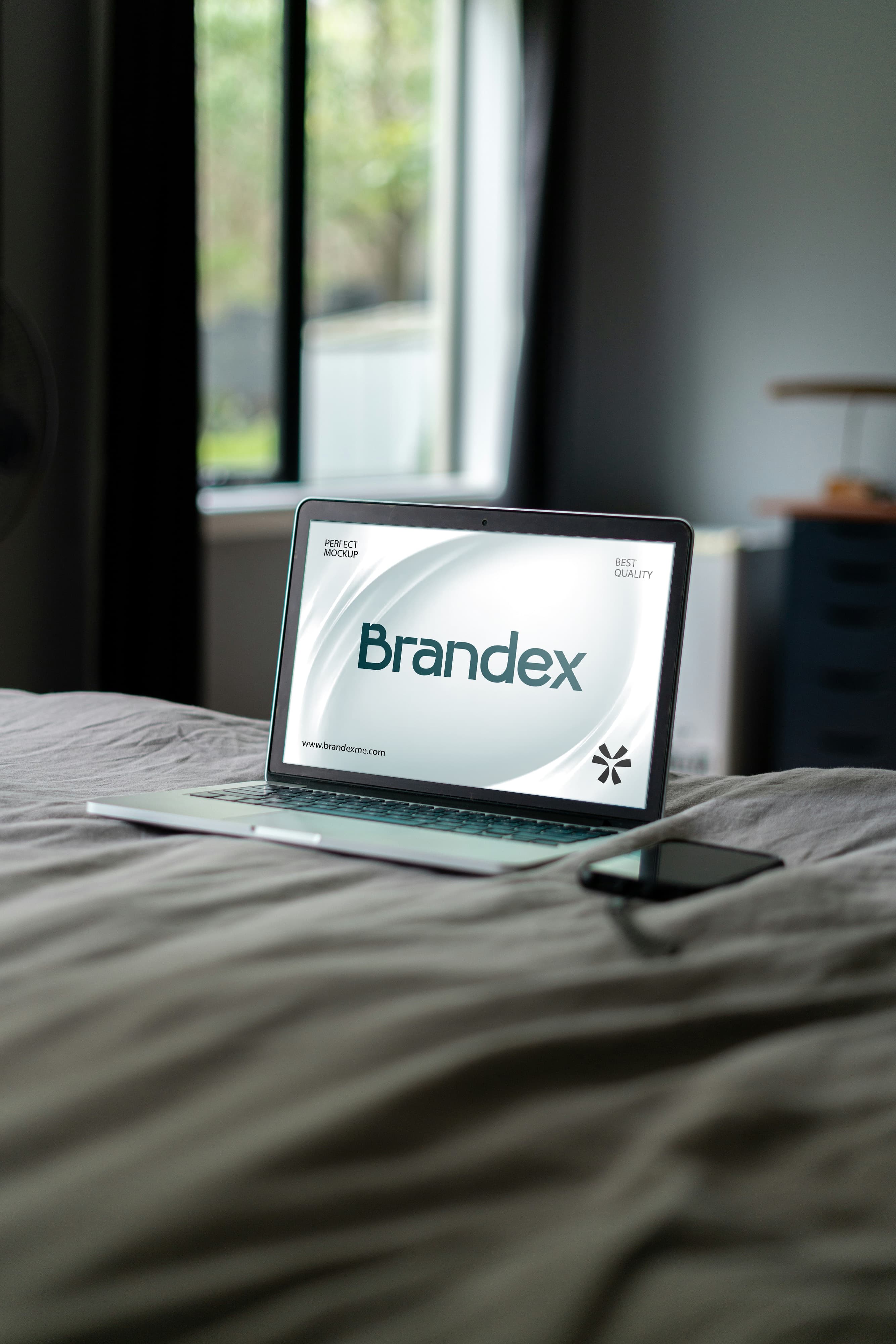 Laptop screen on bed mockup