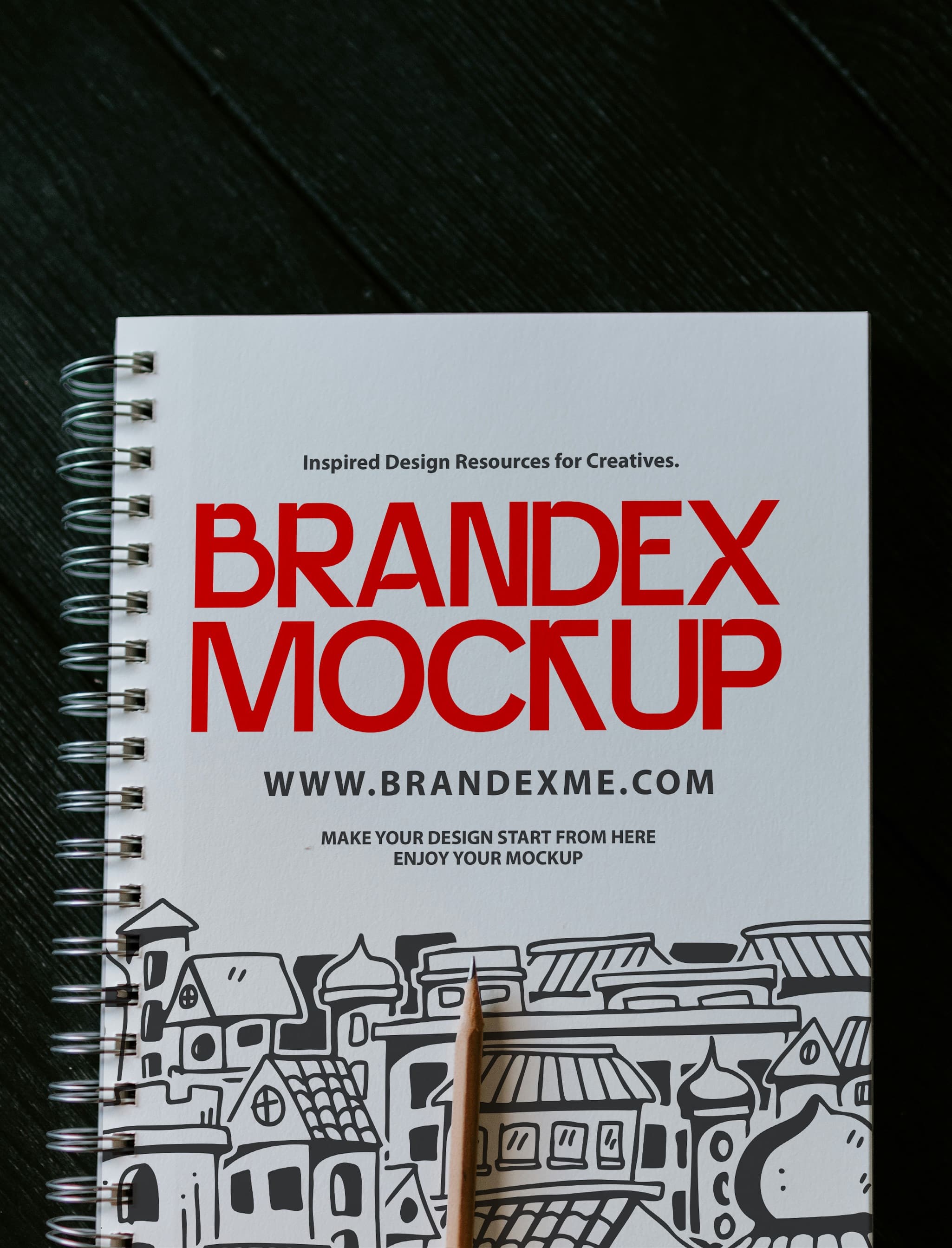 Spiral notebook with pen mockup