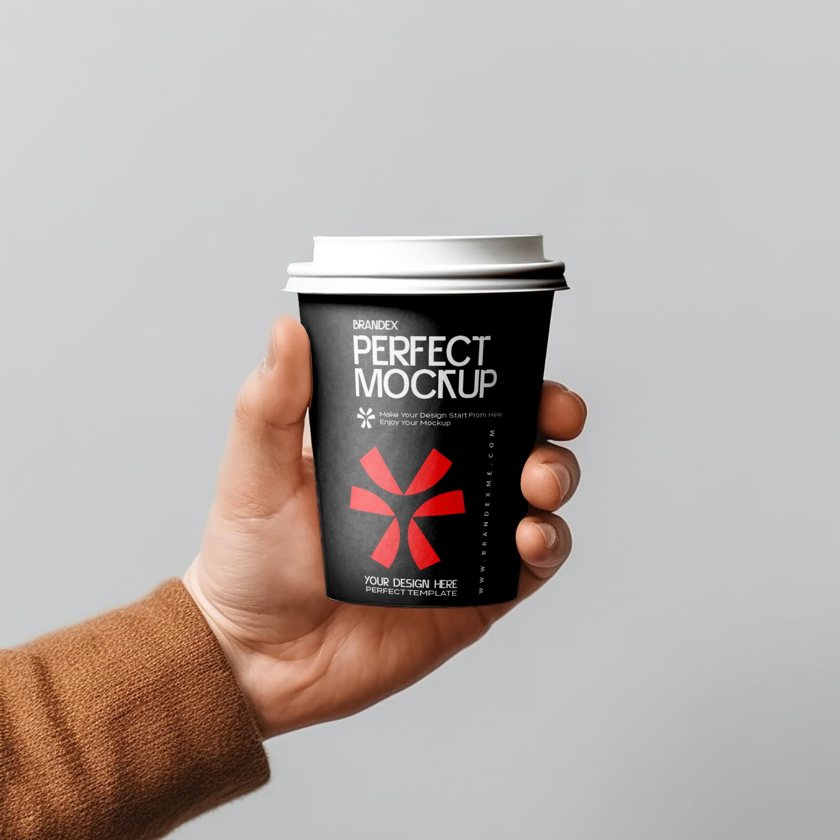 Handheld black paper cup mockup