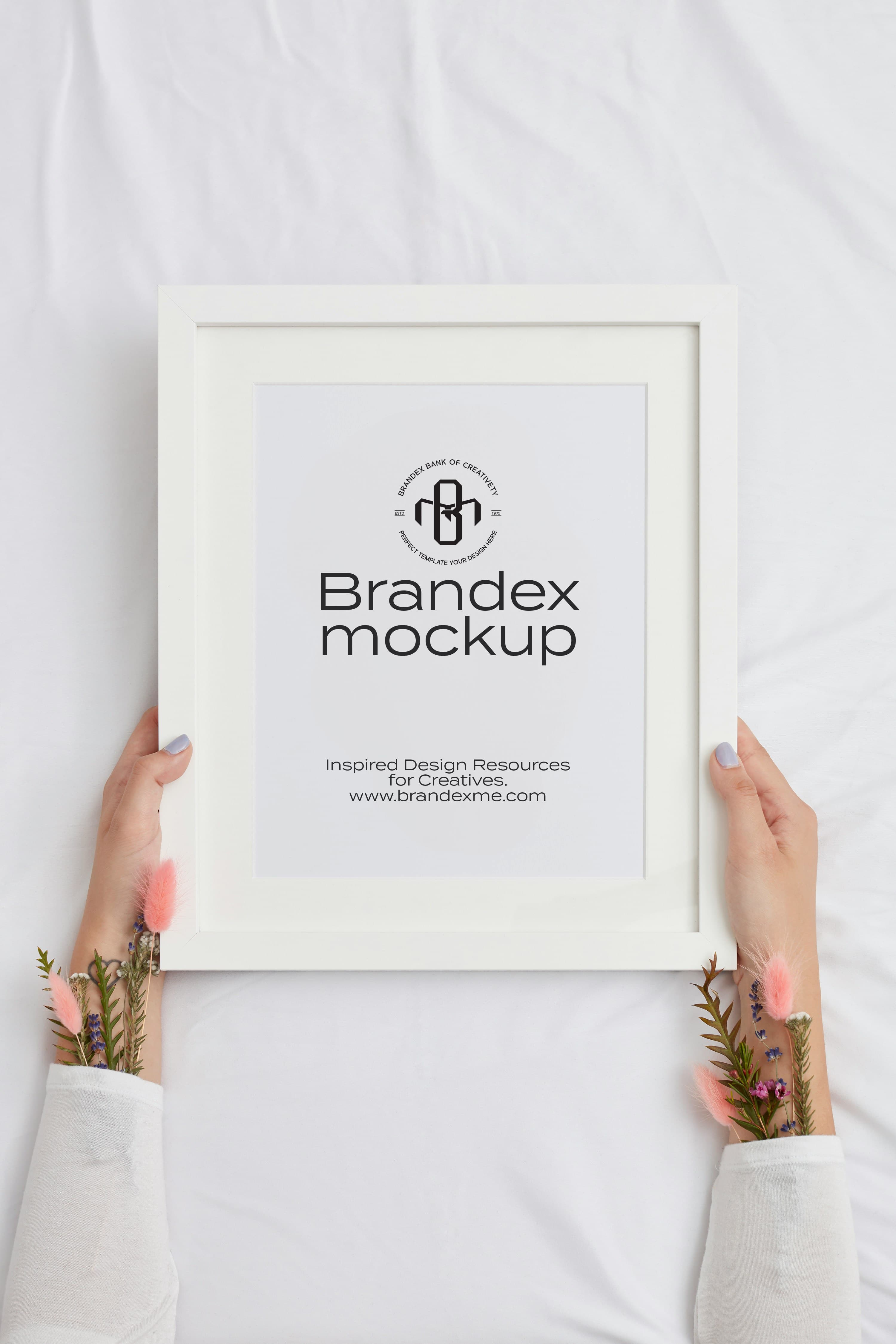 White frame in hands mockup