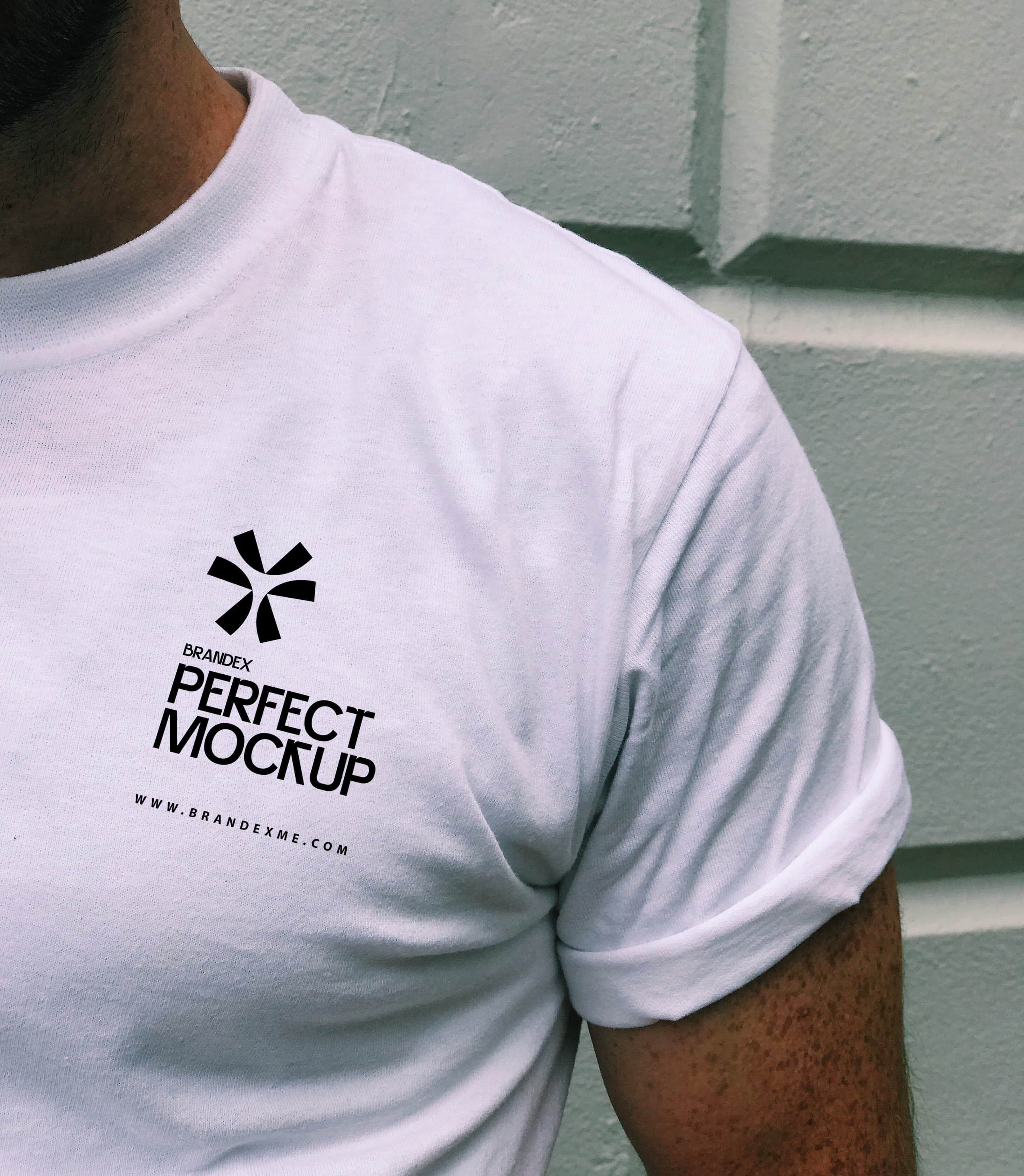 White Crewneck T-Shirt Mockup Worn by Person – Chest Close-Up Angle
