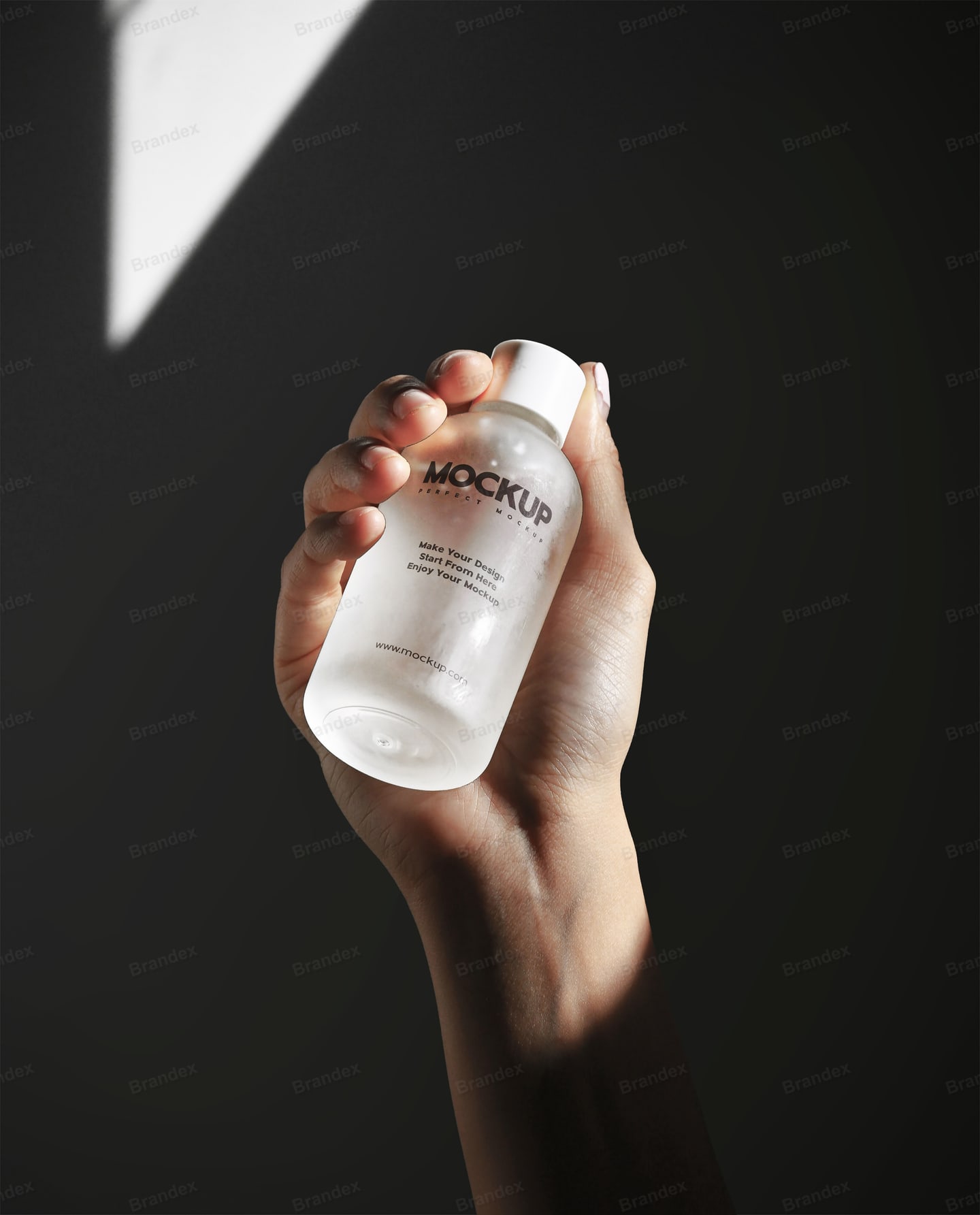 Frosted Cosmetic Bottle Mockup Hand Holding Dark Background