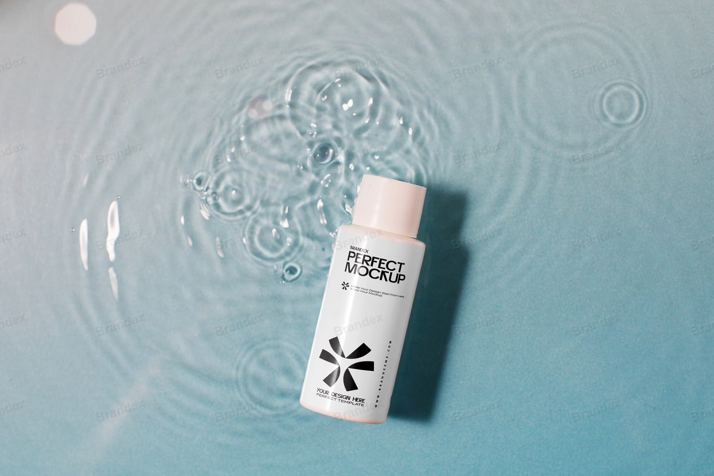 Floating Cosmetic Bottle Mockup Blue Water Ripple Scene Product Display