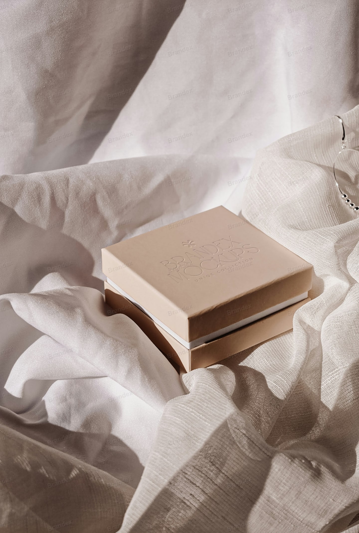 Elegant Beige Gift Box Mockup on Soft Linen Fabric