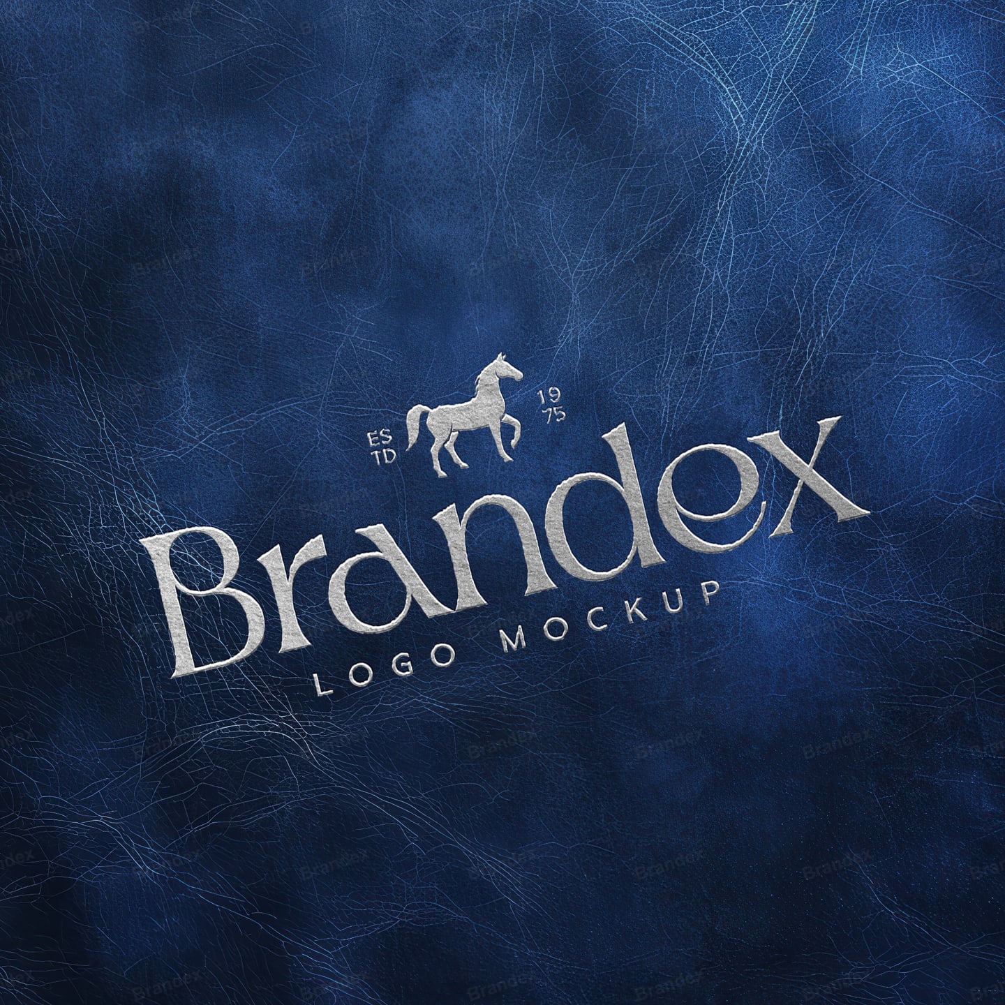 Silver Foil Debossed Logo Mockup on Blue Worn Leather Texture